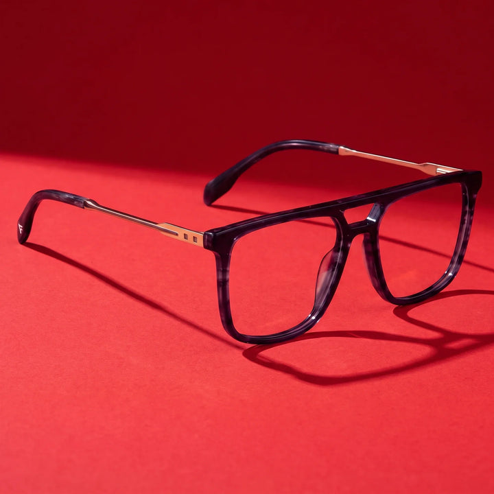 Anteojos Fiore 10177 en gris – editorial still life on a saturated vivid red set