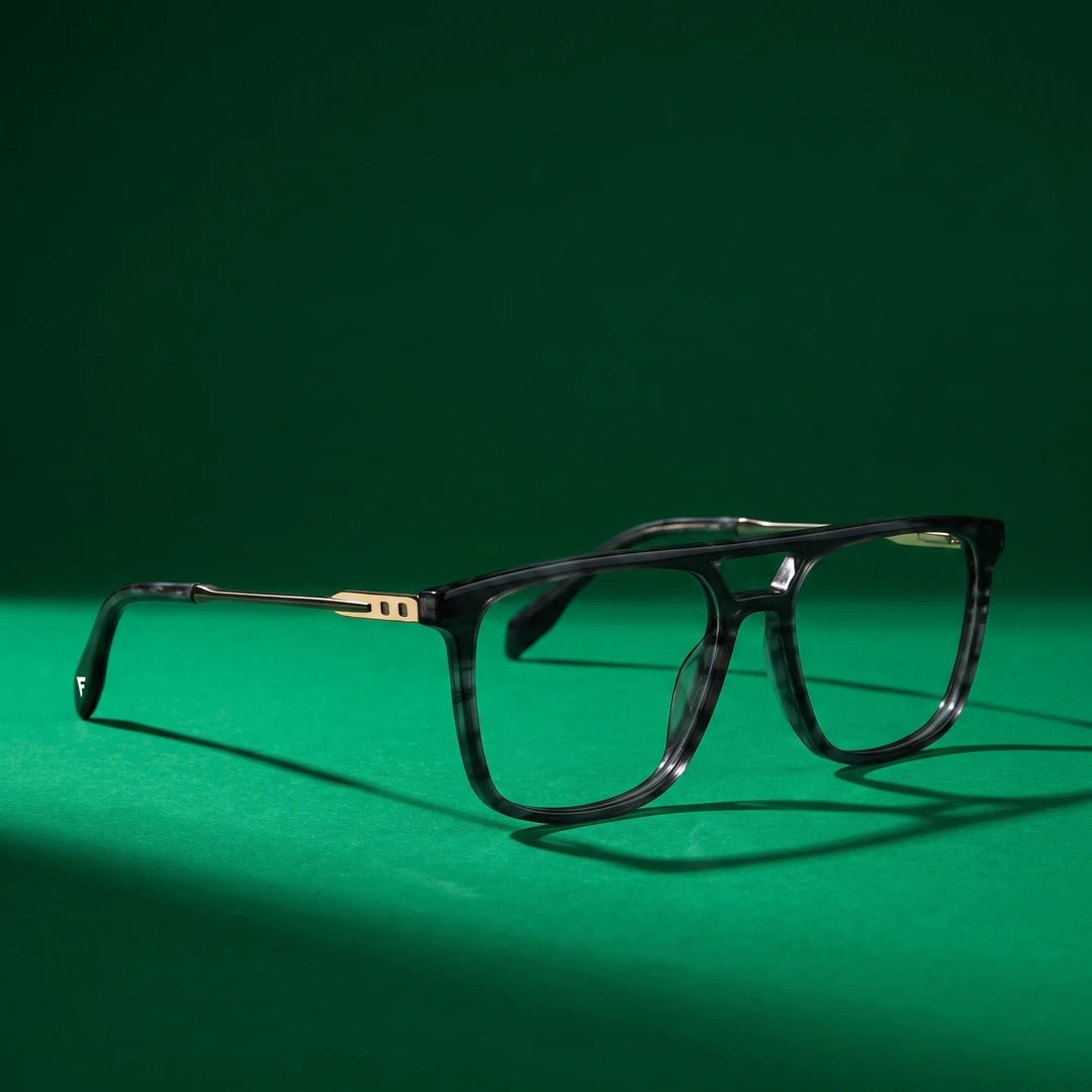 Anteojos Fiore 10177 en gris – still life on a seamless emerald studio backdrop