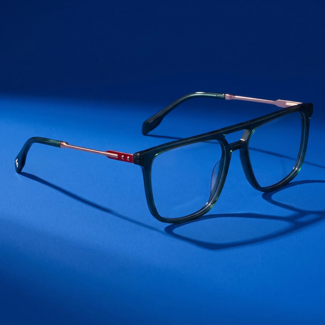 Anteojos Fiore 10177 en verde – editorial still life on a saturated cobalt set