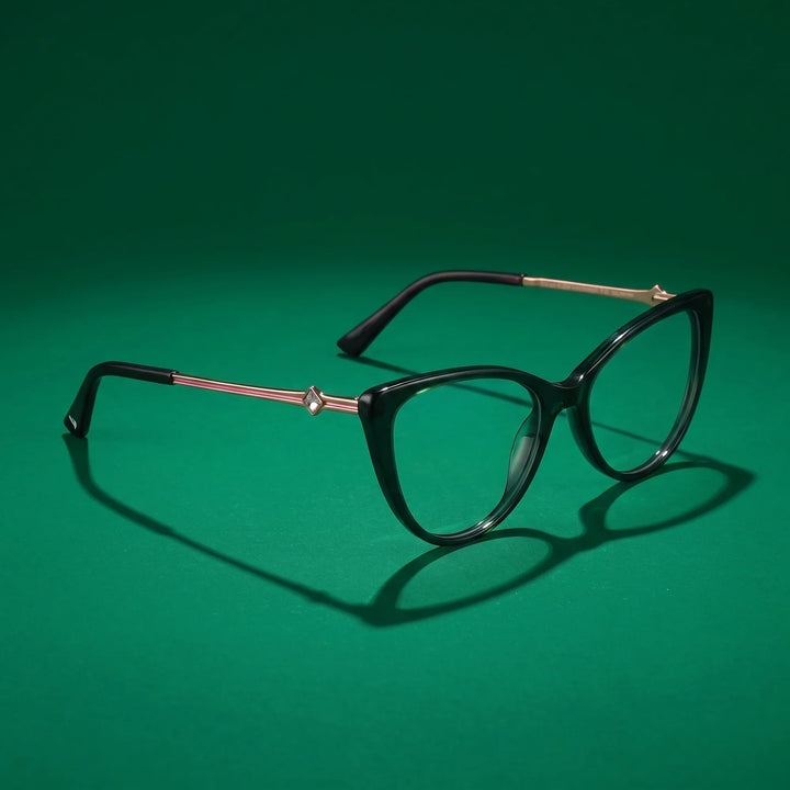 Anteojos Fiore 1031 en verde – hero still life against a deep emerald backdrop