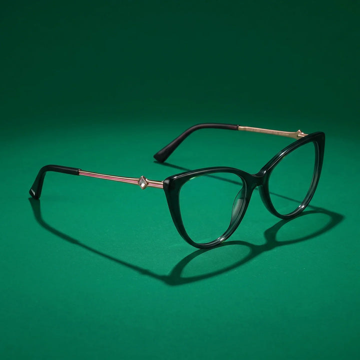 Anteojos Fiore 1031 en verde – hero still life against a deep emerald backdrop