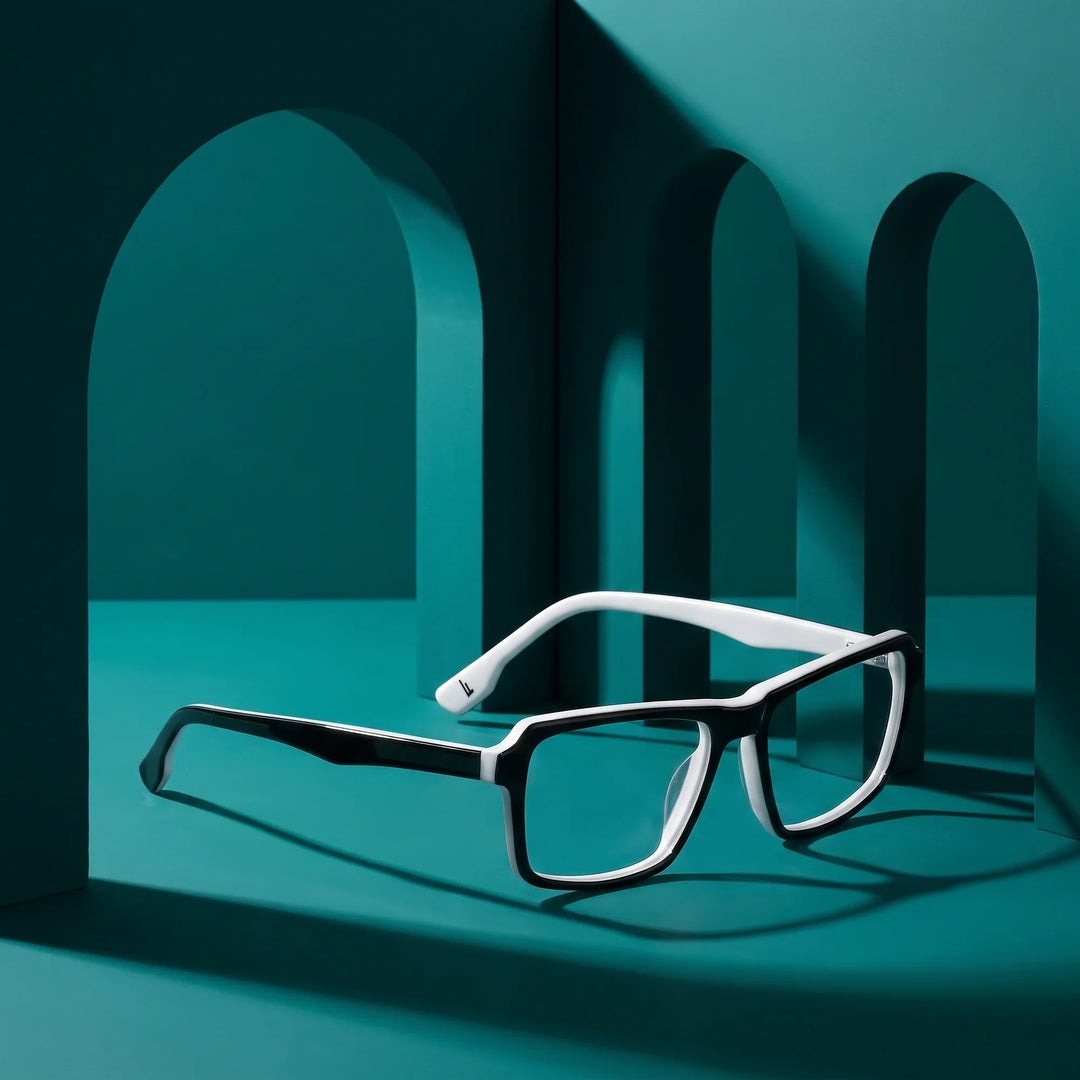 Anteojos Fiore 1038 en black white – still life among monochrome teal arches