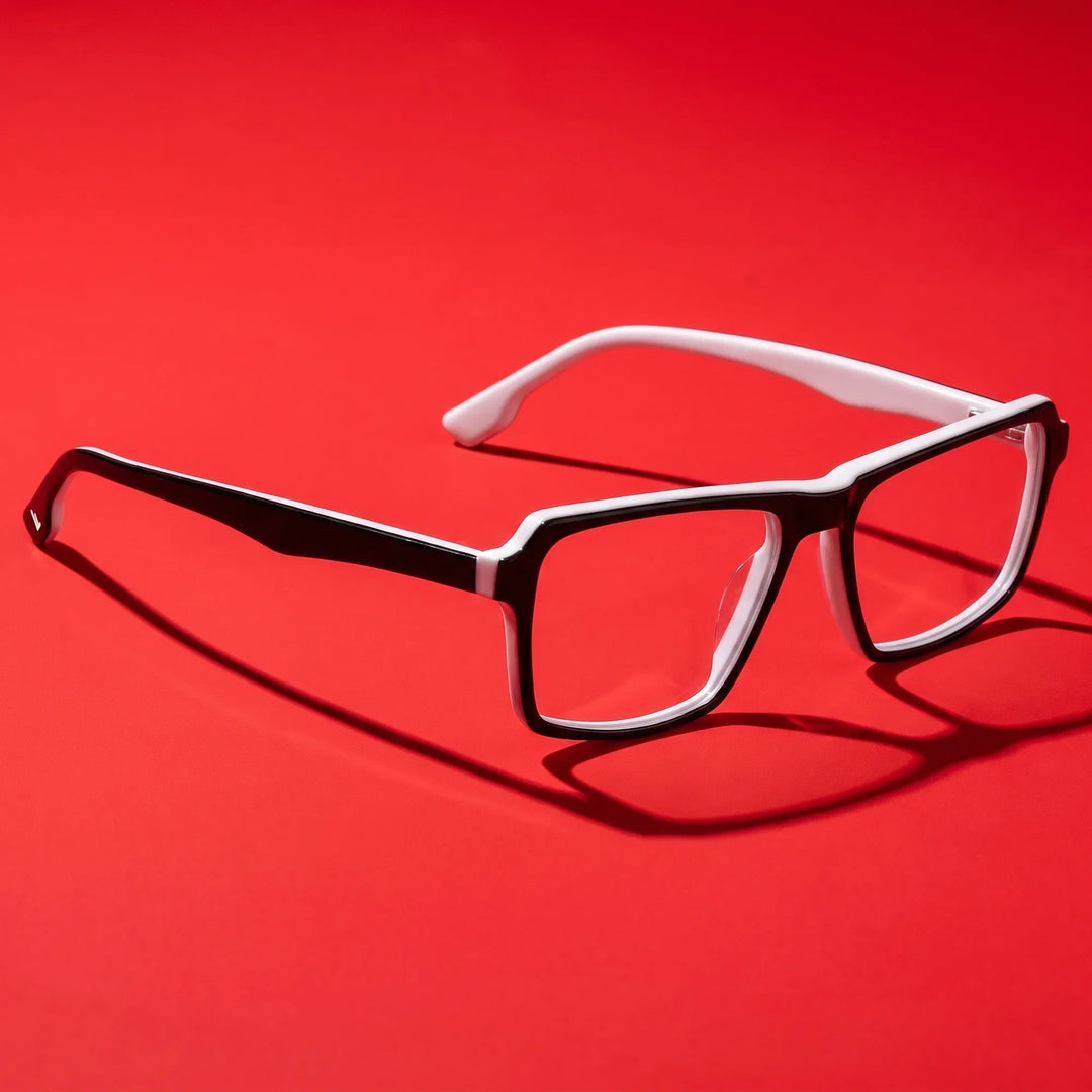 Anteojos Fiore 1038 en negro blanco – editorial still life on a saturated vivid red set