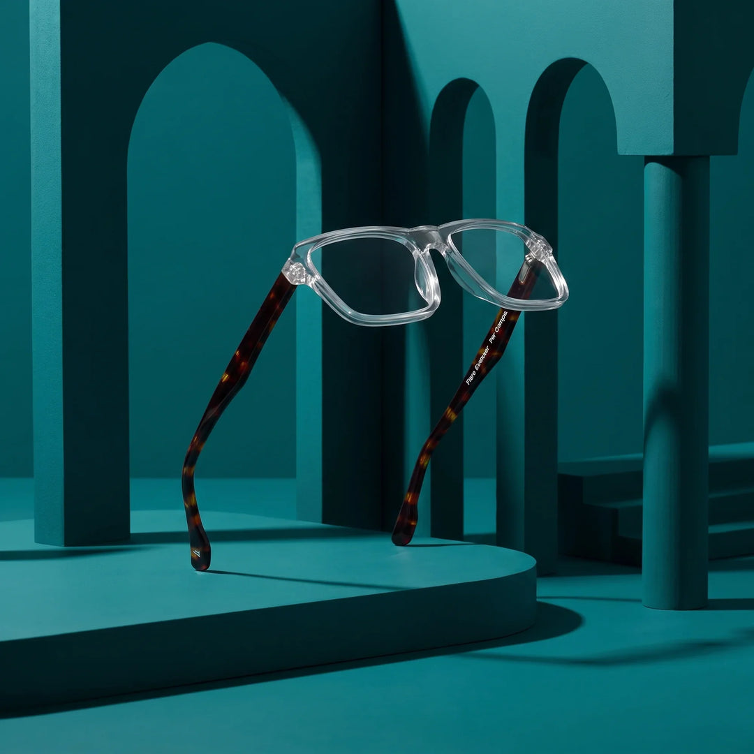 Anteojos Fiore 1038 en transparent – still life among monochrome teal arches