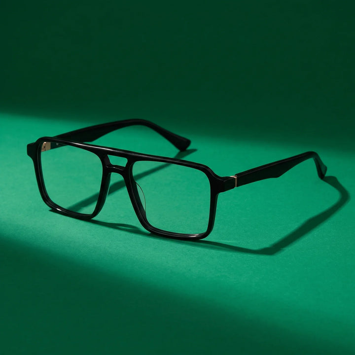 Anteojos Fiore 1039 en negro – still life on a seamless emerald studio backdrop