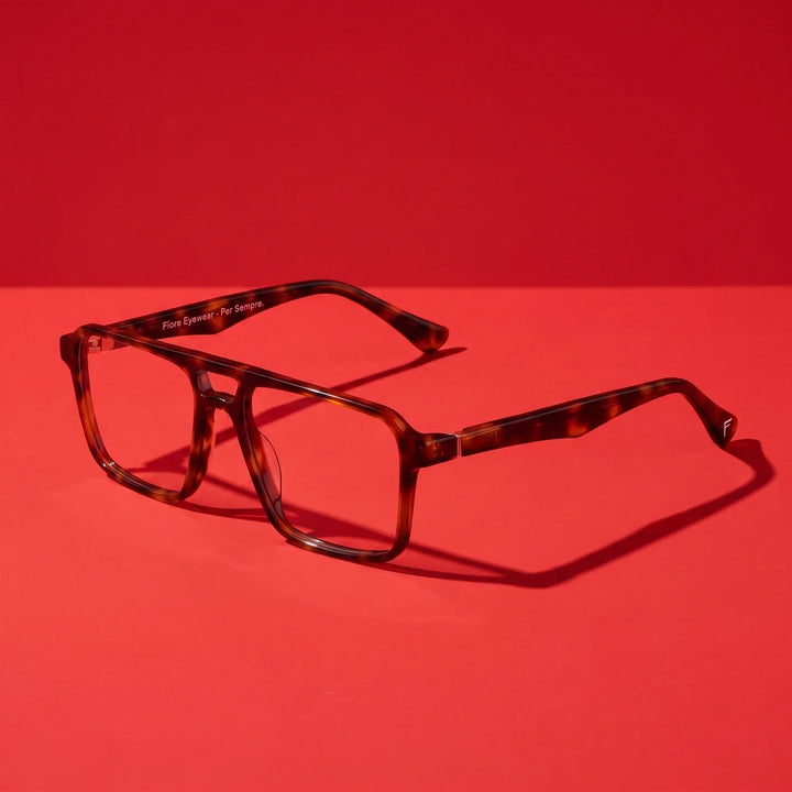 Anteojos Fiore 1039 en carey – hero still life against a deep vivid red backdrop