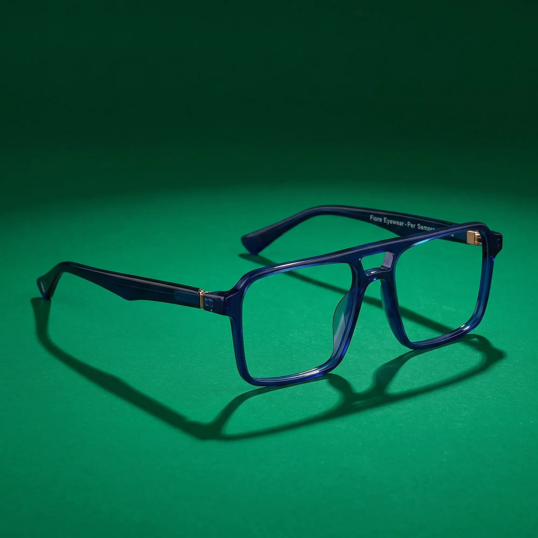 Anteojos Fiore 1039 en azul – still life on a seamless emerald studio backdrop