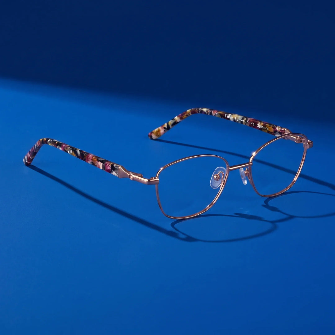 Anteojos Fiore 2208 en brown tortoiseshell – hero still life against a deep cobalt backdrop