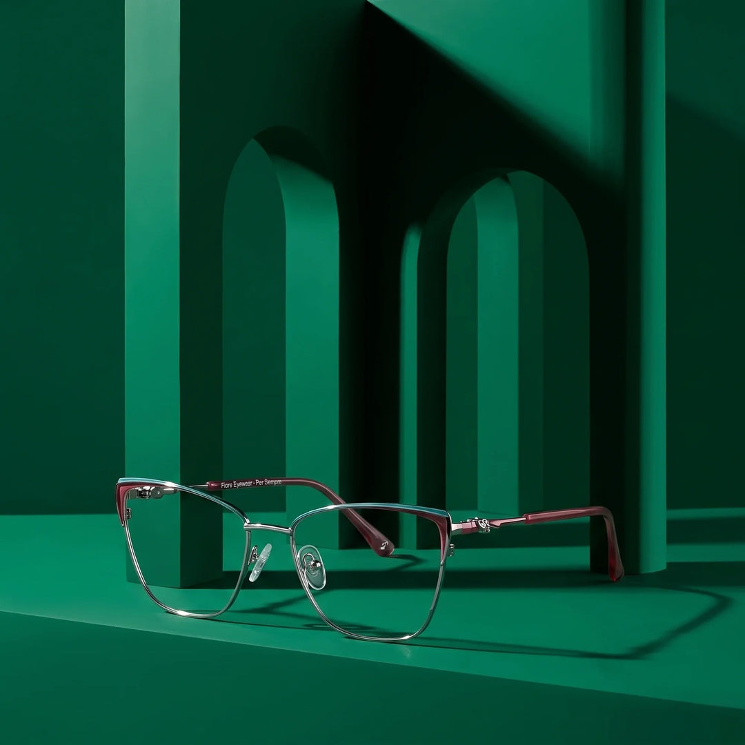 Anteojos Fiore 3839 en red gun – displayed on a emerald podium among arches
