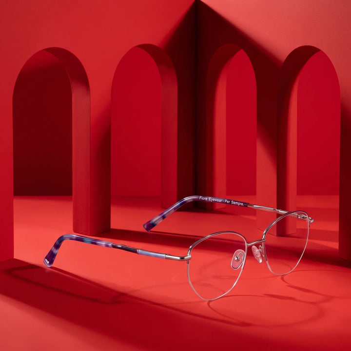 Anteojos Fiore 3921 en purple silver – staged on a sculptural vivid red architecture set