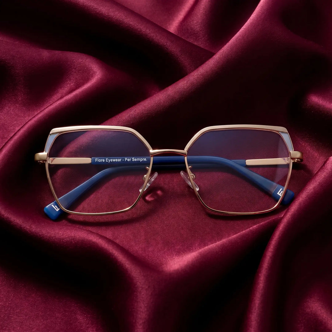 Anteojos Fiore 3971 en grey gold – nested in flowing burgundy silk