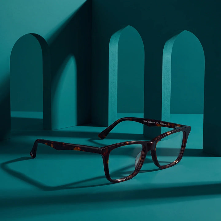 Anteojos Fiore 5228 en tortoiseshell – still life among monochrome teal arches