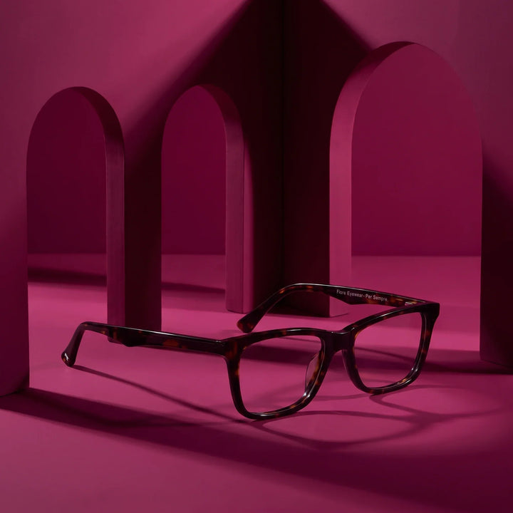 Anteojos Fiore 5228 en carey – staged on a sculptural magenta architecture set