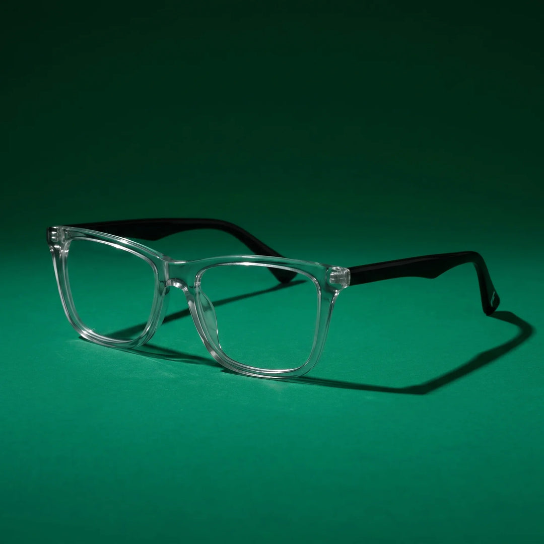 Anteojos Fiore 5228 en transparent – still life on a seamless emerald studio backdrop