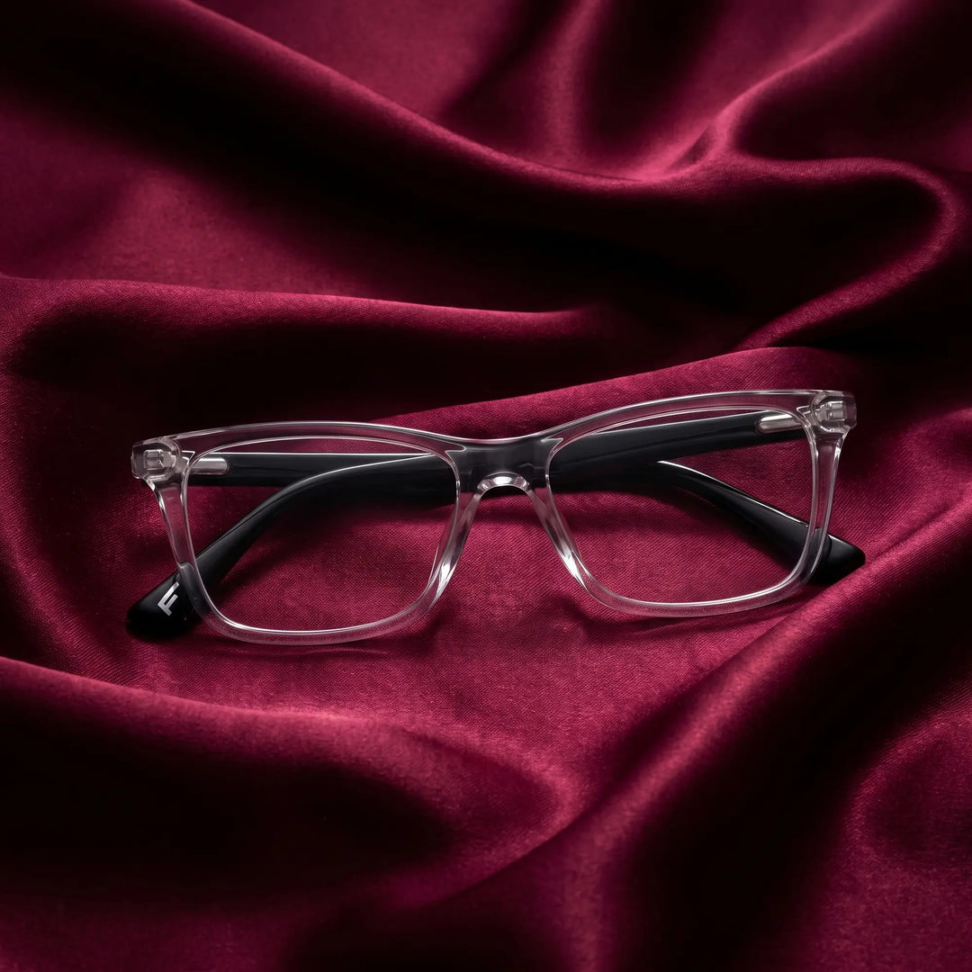 Anteojos Fiore 5228 en transparent – nested in flowing burgundy silk