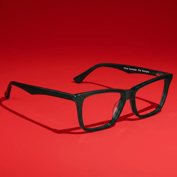 Anteojos Fiore 5228 en verde – editorial still life on a saturated vivid red set