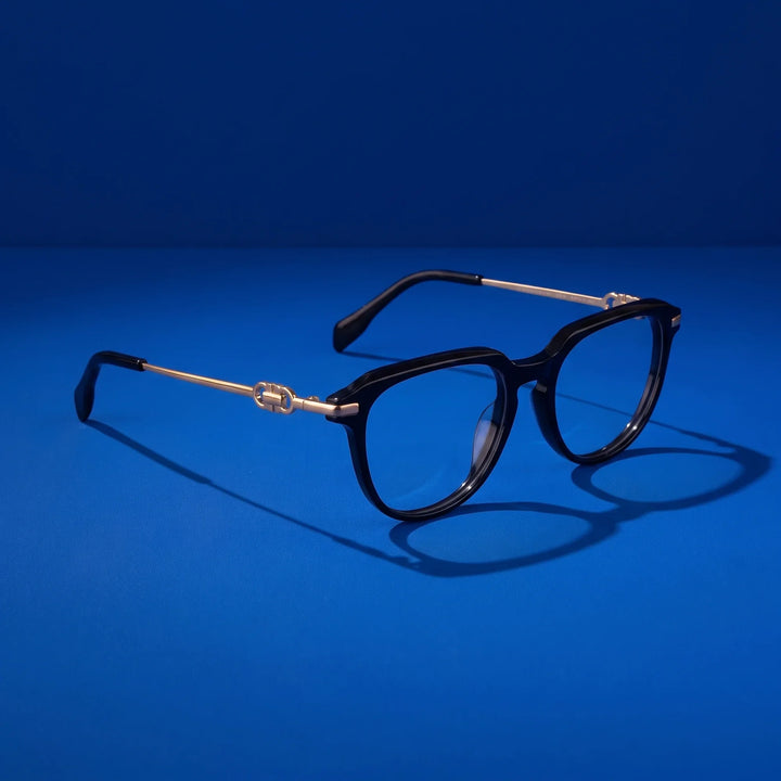 Anteojos Fiore 5409 en negro – hero still life against a deep cobalt backdrop
