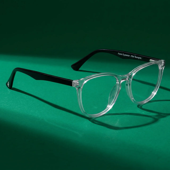 Anteojos Fiore 7046 en transparent – still life on a seamless emerald studio backdrop