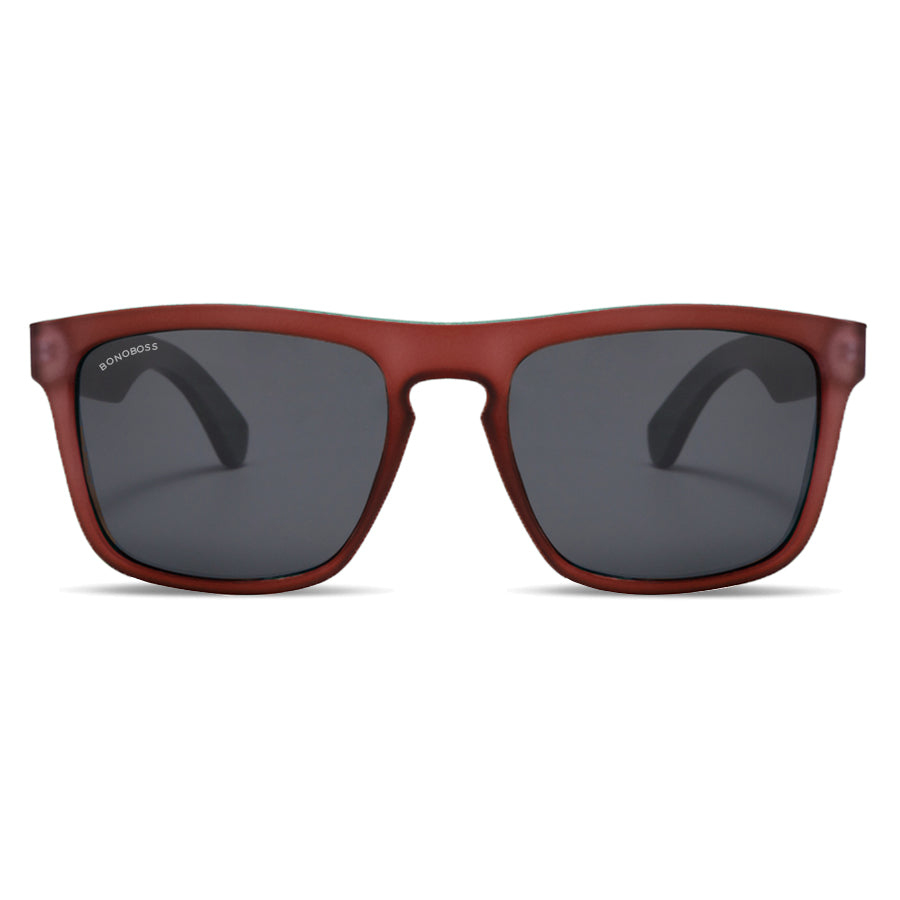 lentes de sol polarizados para hombre y mujer rectangulares de color rojo con patas de madera natural sustentable. Marco de plastico reciclado con lentes polarizadas