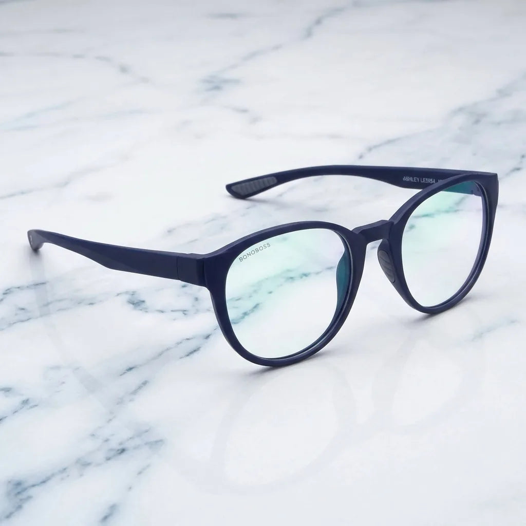 Lentes ópticos Ashley Azul sobre mármol blanco elegante armazón premium Bonoboss #editorial_armazon #color_azul