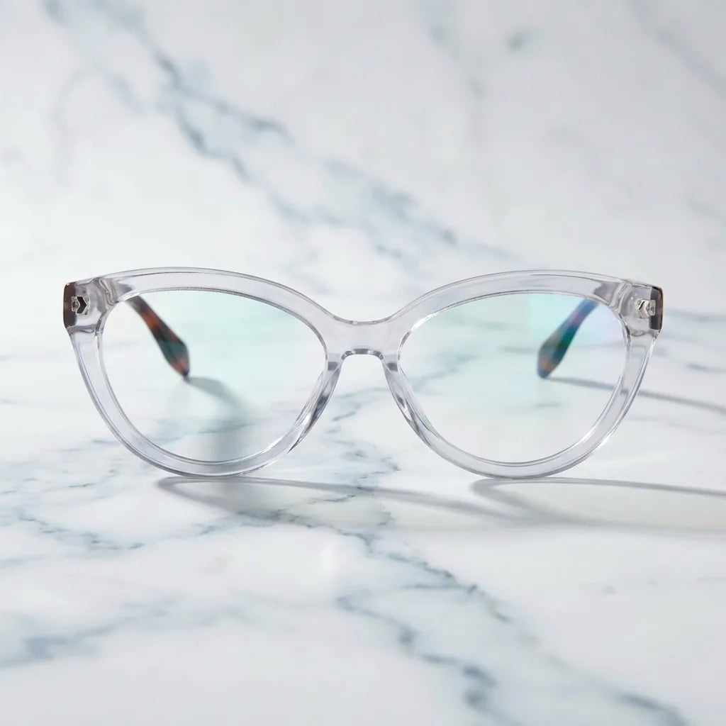 Lentes ópticos Aurora Transparente sobre mármol blanco elegante calidad premium receta Bonoboss #editorial_banner_confianza #color_transparente