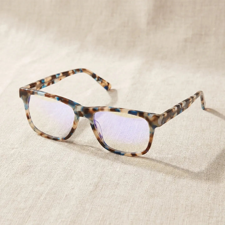 Lentes ópticos Canelo Blue sobre lino crudo artesanal armazón premium Bonoboss #editorial_armazon #color_blue