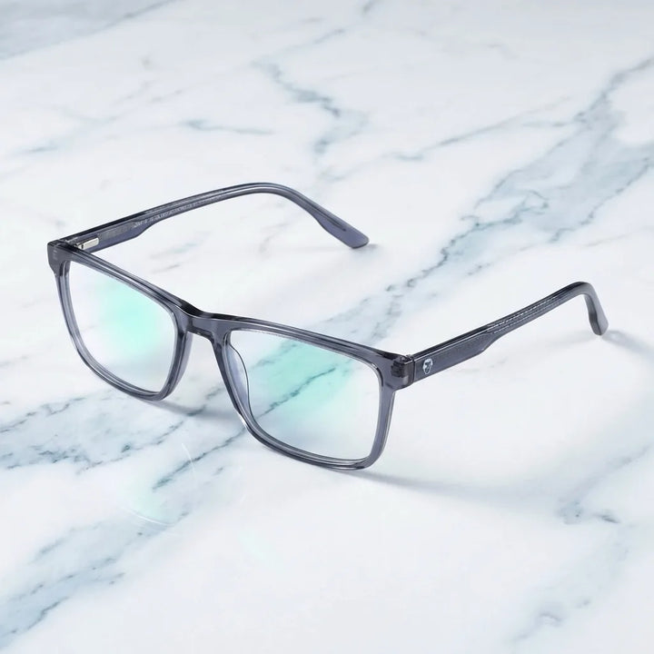 Lentes ópticos Canelo Transparente sobre mármol blanco elegante armazón premium Bonoboss #editorial_armazon #color_transparente