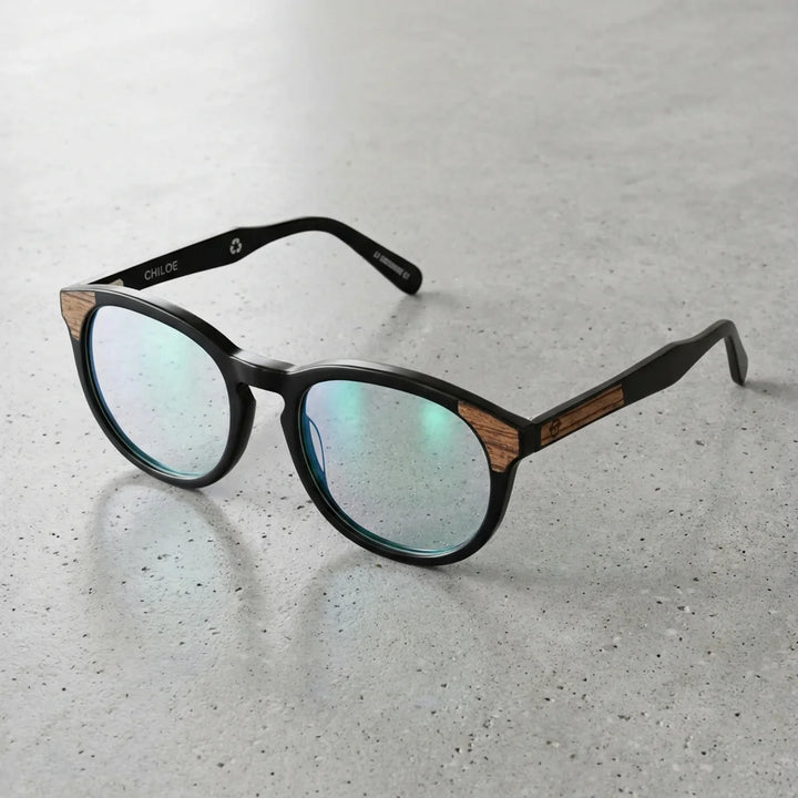 Lentes ópticos Chiloe 0084 Opticos Negro sobre superficie premium calidad premium receta Bonoboss #editorial_banner_confianza #color_negro