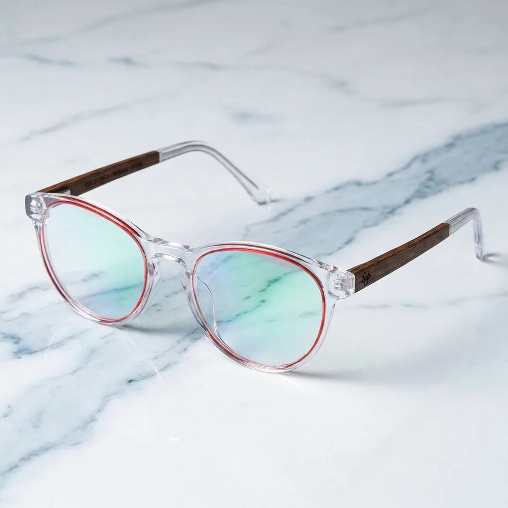 Lentes ópticos Chiloe Rojo sobre mármol blanco elegante armazón premium Bonoboss #editorial_armazon #color_rojo