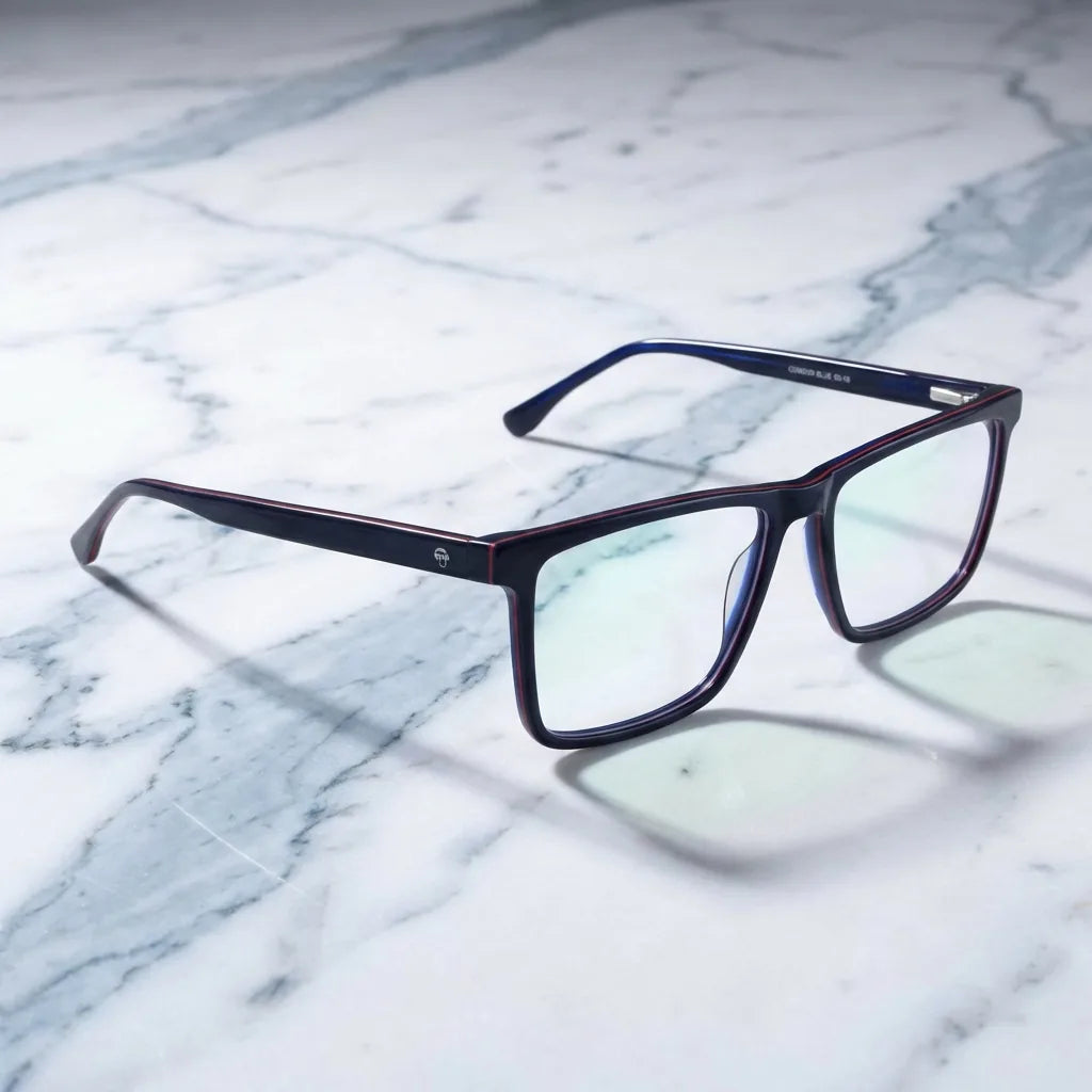 Lentes ópticos Condor Azul sobre mármol blanco elegante armazón premium Bonoboss #editorial_armazon #color_azul