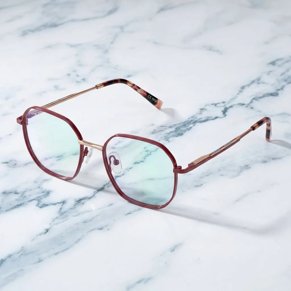 Lentes ópticos Galapagos Metal Rojo sobre mármol blanco elegante armazón premium Bonoboss #editorial_armazon #color_rojo