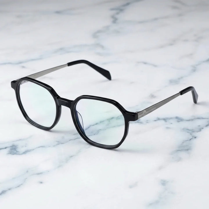 Lentes ópticos Galapagos Negro sobre mármol blanco elegante armazón premium Bonoboss #editorial_armazon #color_negro