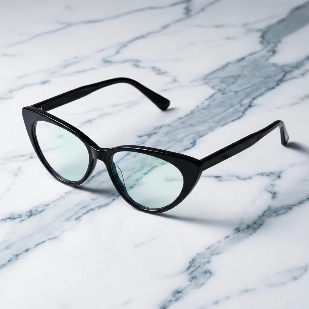 Lentes ópticos Hamburgo Negro sobre mármol blanco elegante armazón premium Bonoboss #editorial_armazon #color_negro