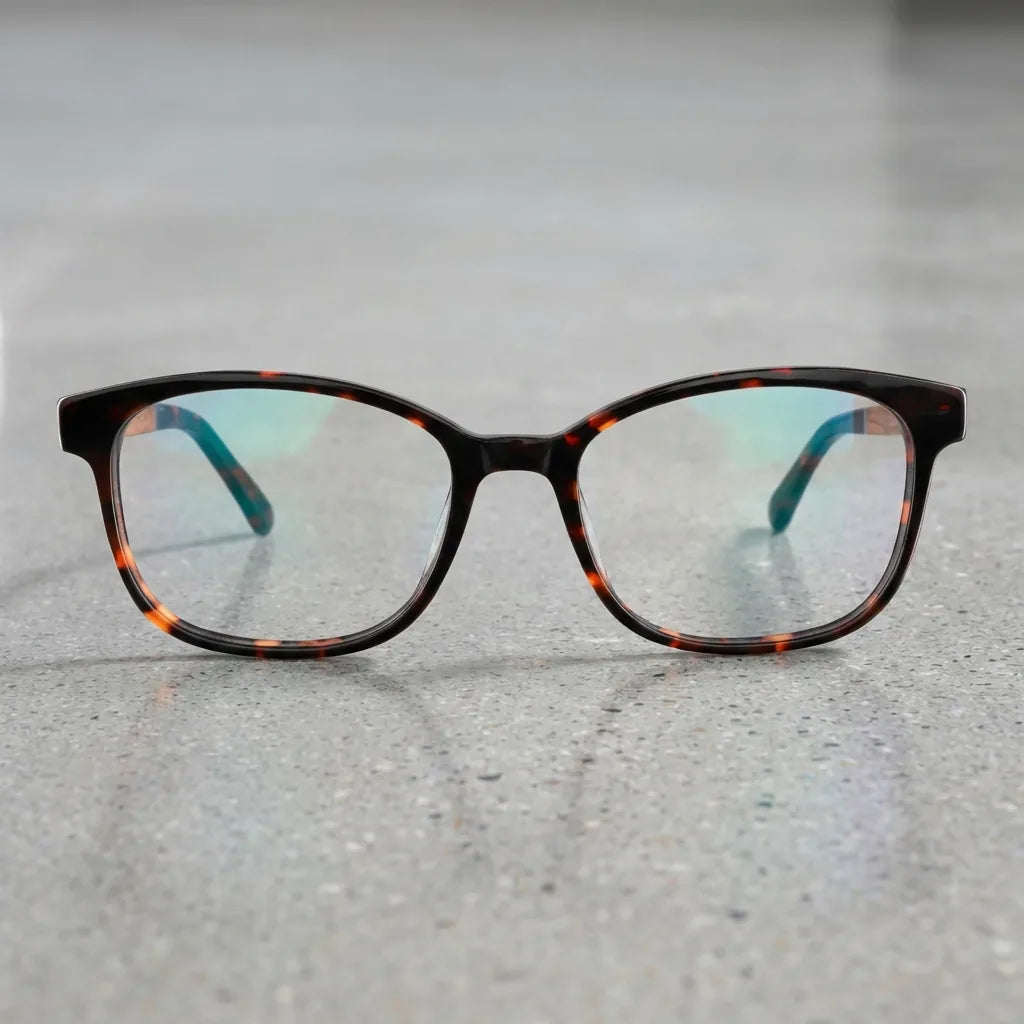 Lentes ópticos Hanga Roa Carey sobre concreto pulido minimalista armazón premium Bonoboss #editorial_armazon #color_carey