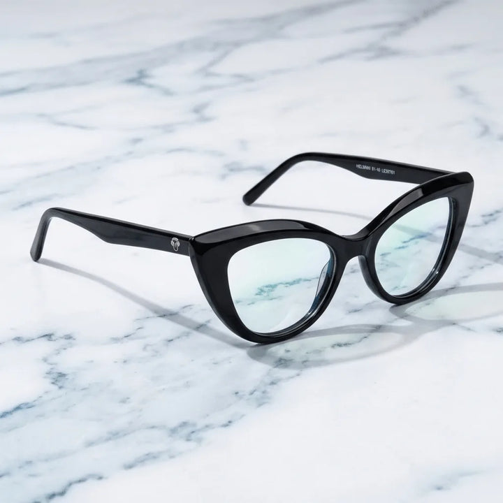 Lentes ópticos Helsinki Negro sobre mármol blanco elegante armazón premium Bonoboss #editorial_armazon #color_negro