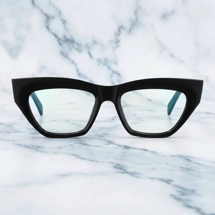 Lentes ópticos Minerva Negro sobre mármol blanco elegante calidad premium receta Bonoboss #editorial_banner_confianza #color_negro