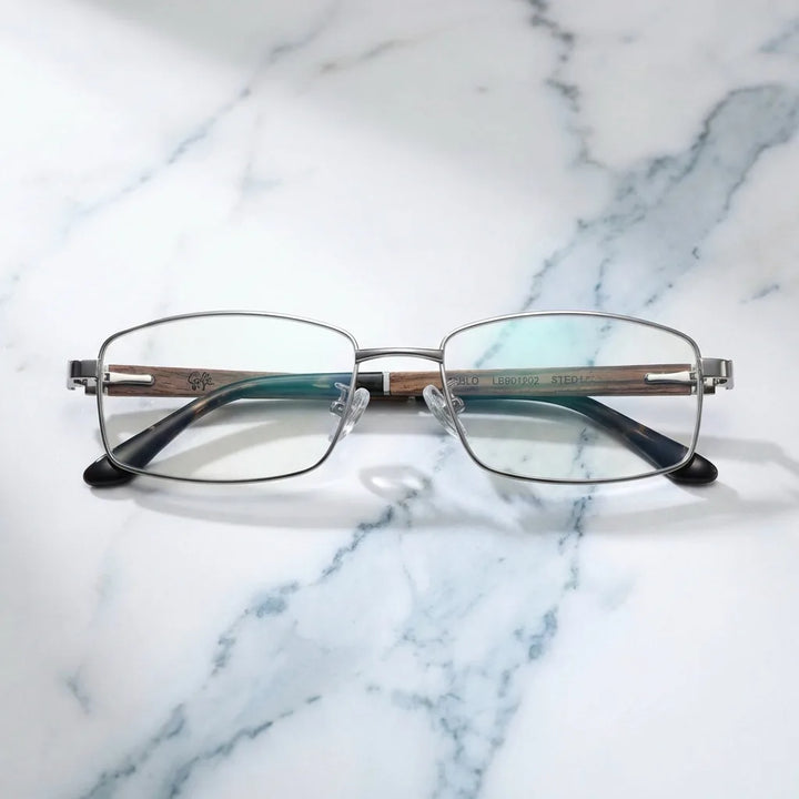 Lentes ópticos Pablo Silver sobre mármol blanco elegante armazón premium Bonoboss #editorial_armazon #color_silver