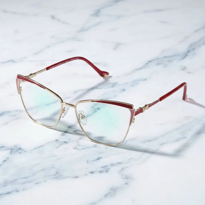 Lentes ópticos Sabrina Rojo sobre mármol blanco elegante armazón premium Bonoboss #editorial_armazon #color_rojo