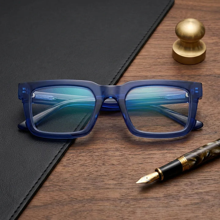 Lentes ópticos Salvador Azul sobre escritorio de madera premium calidad premium receta Bonoboss #editorial_banner_confianza #color_azul