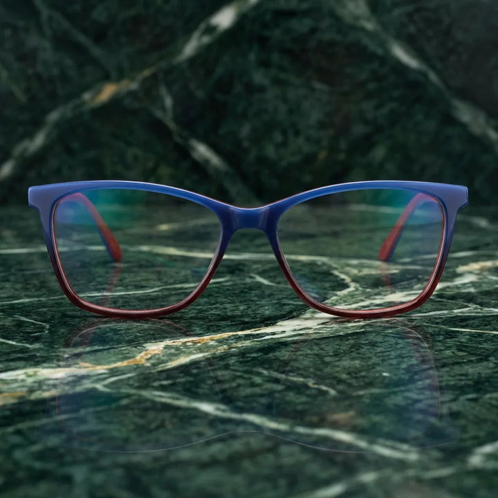 Lentes ópticos Sofia Azul sobre mármol verde natural diseño sustentable Bonoboss #editorial_sustentabilidad #color_azul