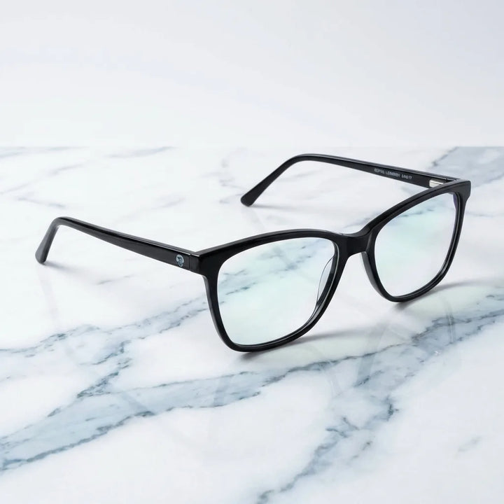 Lentes ópticos Sofia Negro sobre mármol blanco elegante armazón premium Bonoboss #editorial_armazon #color_negro