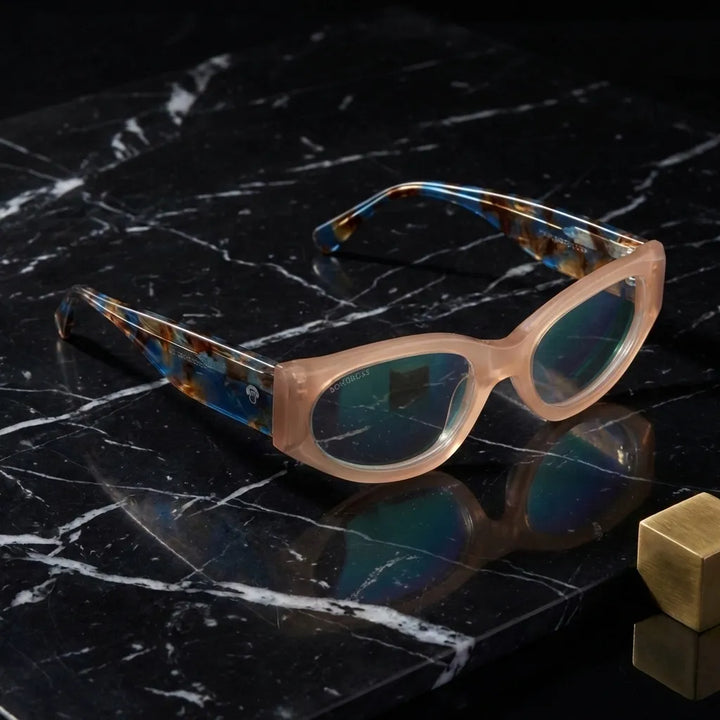 Lentes opticos Milan Peach sobre marmol negro elegante antirreflex receta optica bio-acetato Bonoboss #editorial_marmol-negro #color_peach