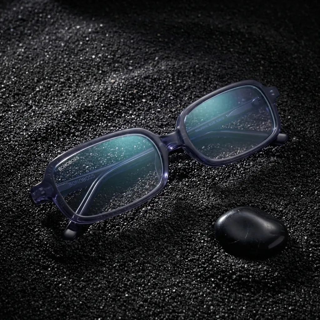 Lentes opticos Navarino Azul sobre arena negra volcanica antirreflex receta optica bio-acetato Bonoboss #editorial_arena-negra #color_azul