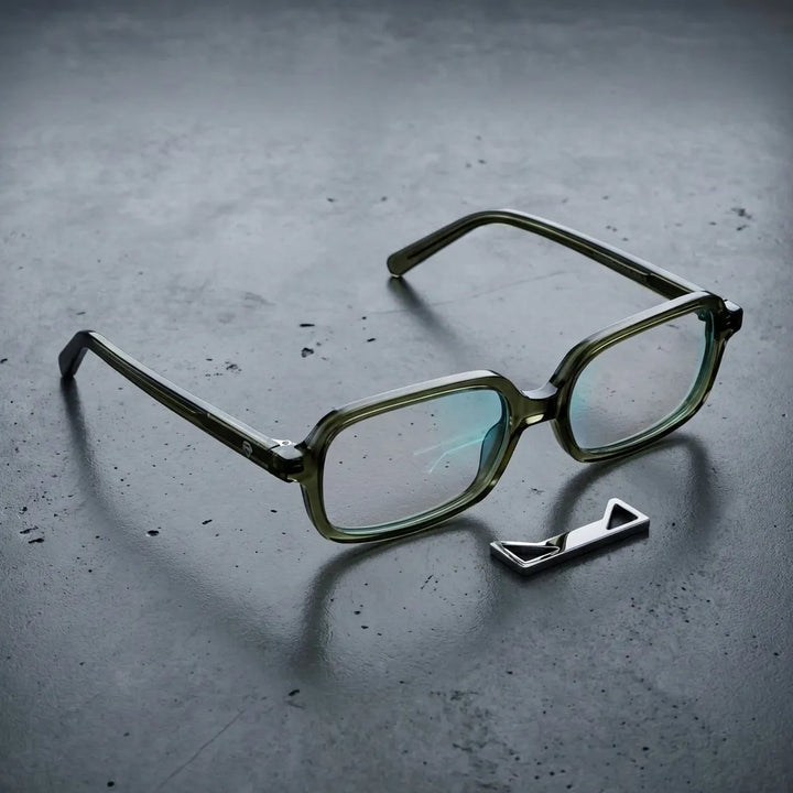 Lentes opticos Navarino Verde sobre concreto urbano minimalista antirreflex receta optica bio-acetato Bonoboss #editorial_concreto-urbano #color_verde