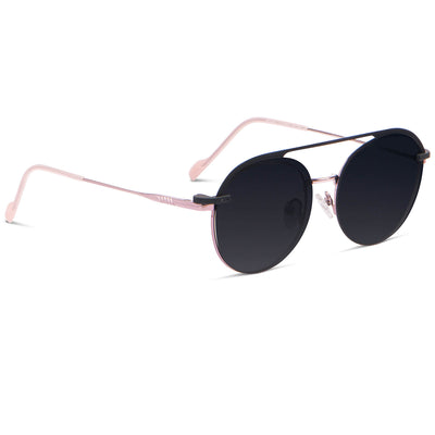 anteojos o marcos opticos redondos de color rosado con sobre lente clip sol iman polarizado para hombre y mujer de color barbie rosado vista angulada montados