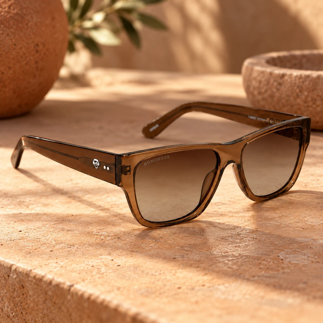 Lentes de sol polarizados Zorros Café Transparente lente Café Degradado bodegón sobre travertino Bonoboss #editorial_banner #color_brown