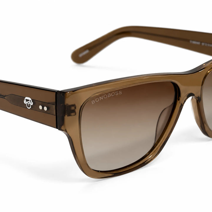 Lentes de sol polarizados Zorros Café transparente, Lente café degradado detalle del armazón y logo #editorial_detail1 #color_brown