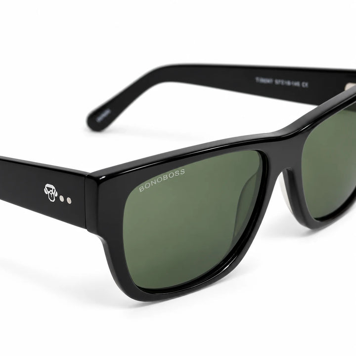 Lentes de sol polarizados Zorros Negro, Lente verde detalle del armazón y logo #editorial_detail1 #color_negro