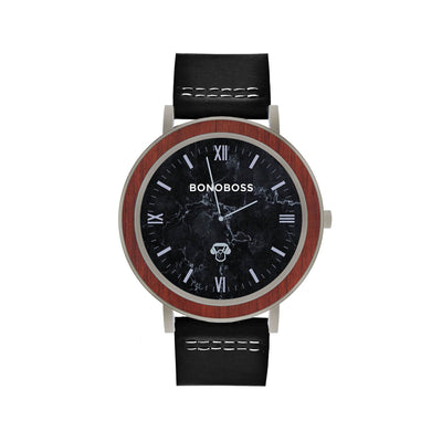 reloj de acero inoxidable plateado con correa de cuero intercambiable negra y fondo negro