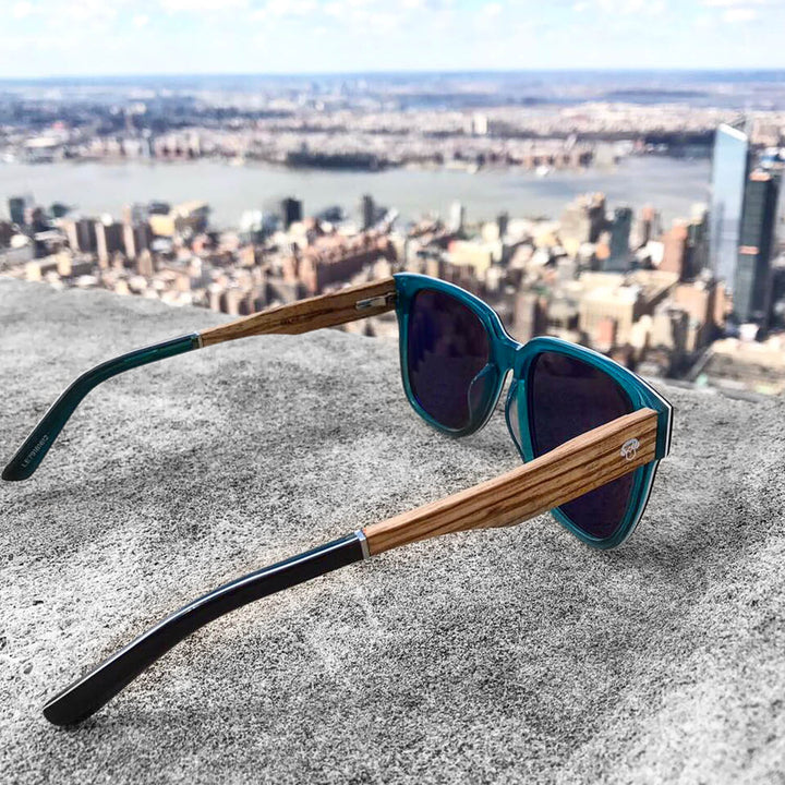 lentes de sol polarizados para hombre y mujer con antireflejo interno y varillas de madera natural sustentables #color_zebrano